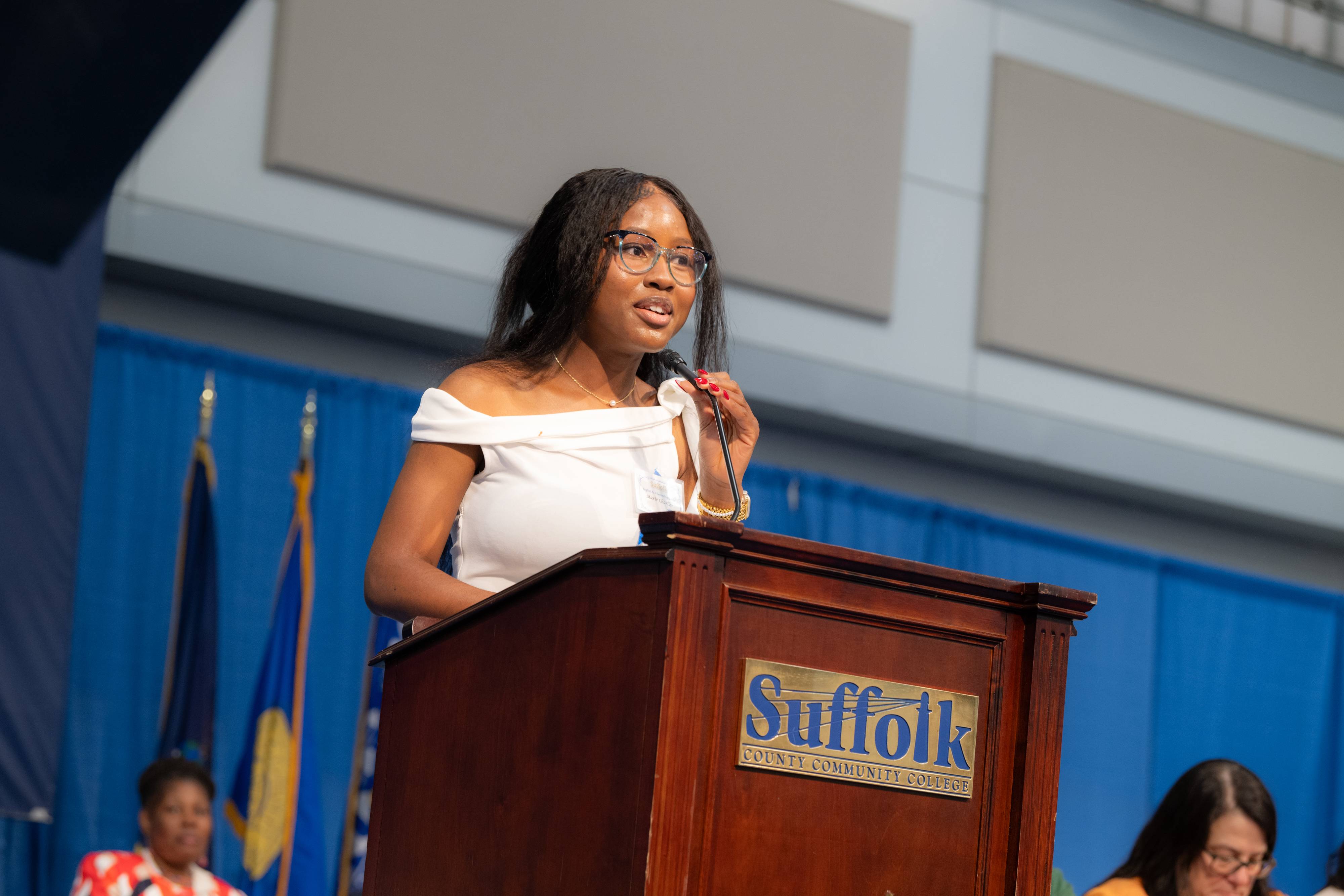ESL Grads speaking at 2025 graduation