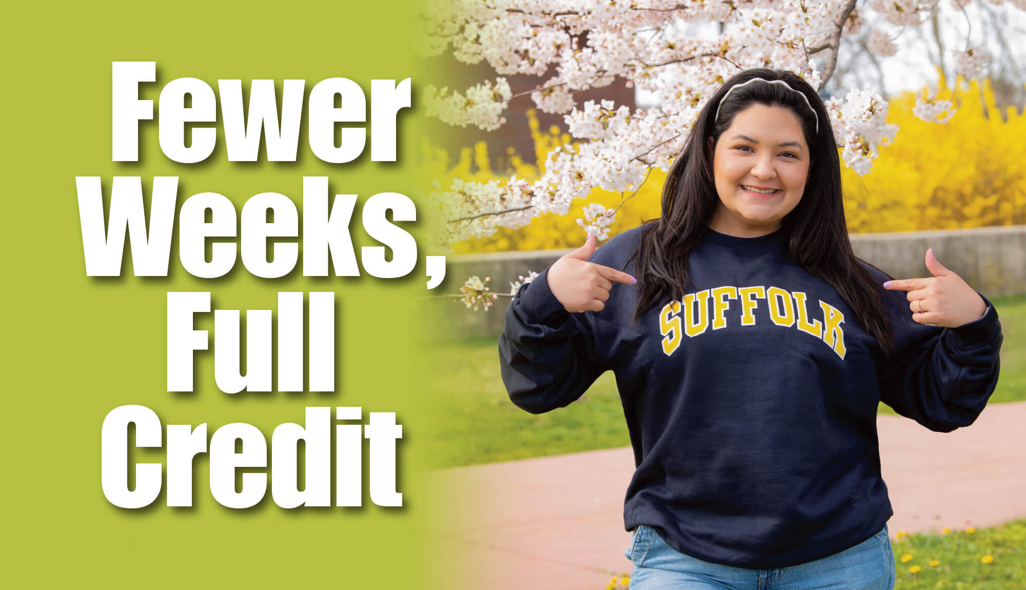 Few Weeks, Full Credit - A female student standing outside on campus wearing a Suffolk sweatshirt.