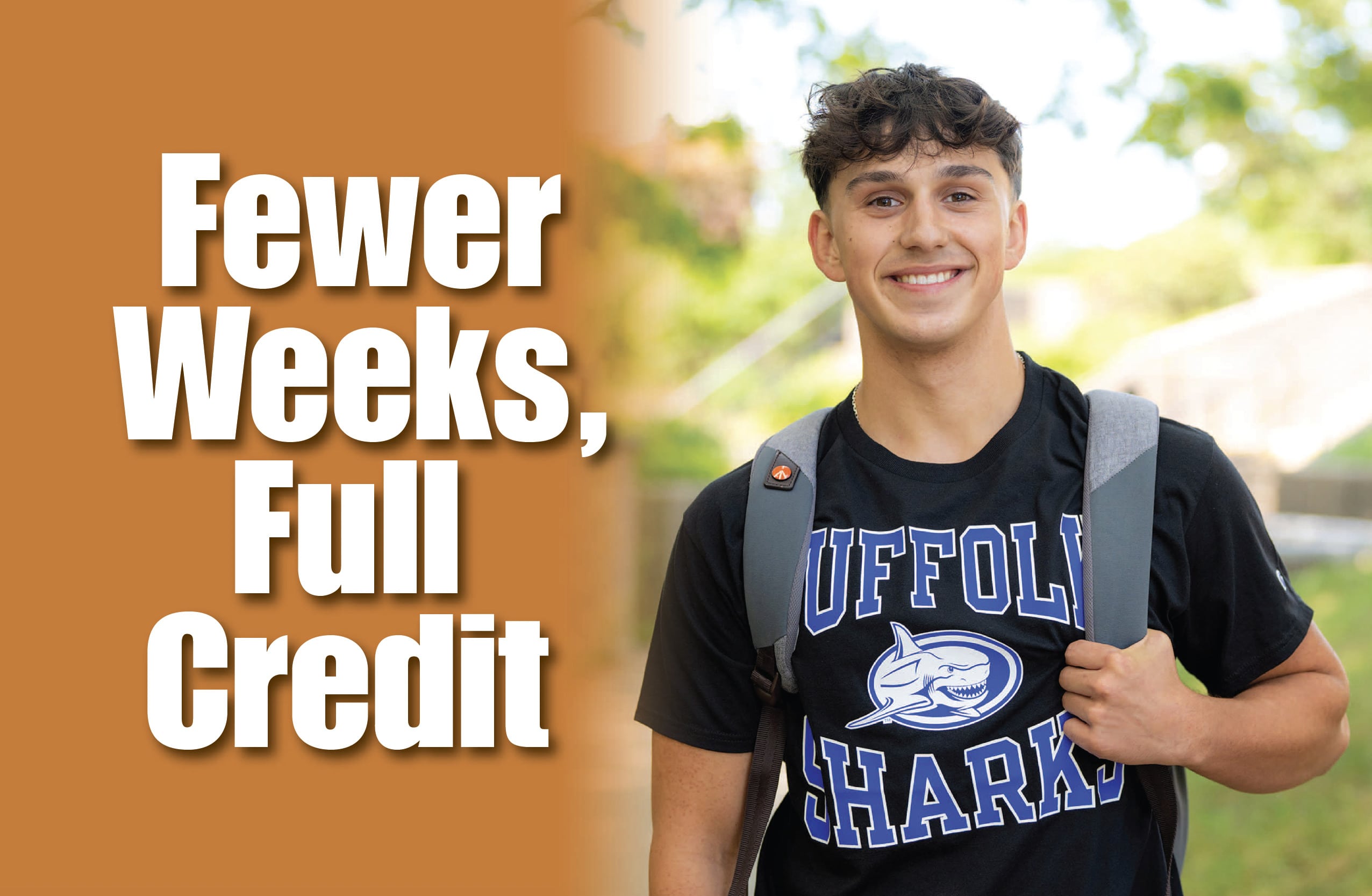 Few Weeks, Full Credit - A male student standing outside on campus wearing a Suffolk sweatshirt.